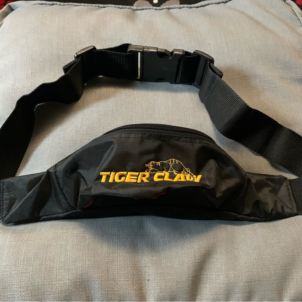 Tiger claw zippered Fanny pack. Adjustable with snap lock.